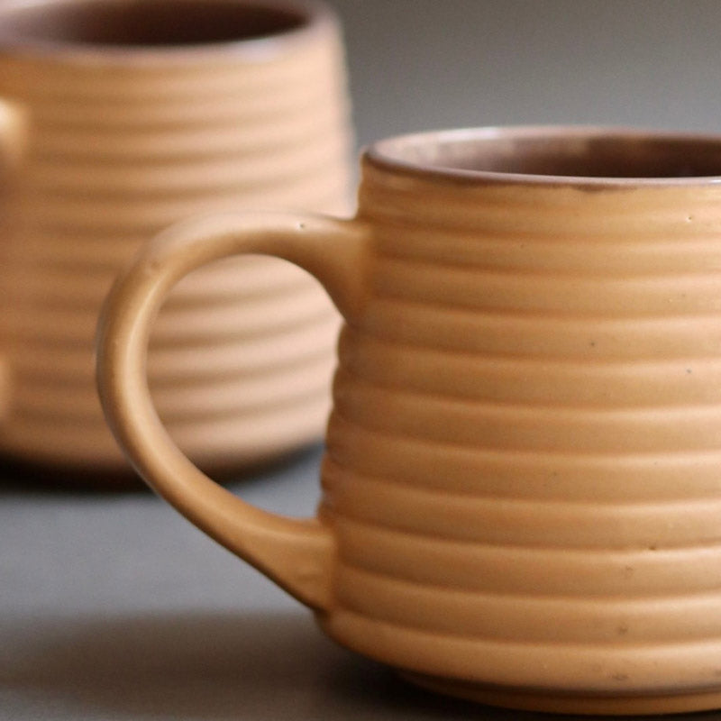 Buy Venia Cream Ceramic Mug (220 ML) - Set of Two Mug & Tea Cup from Vaaree