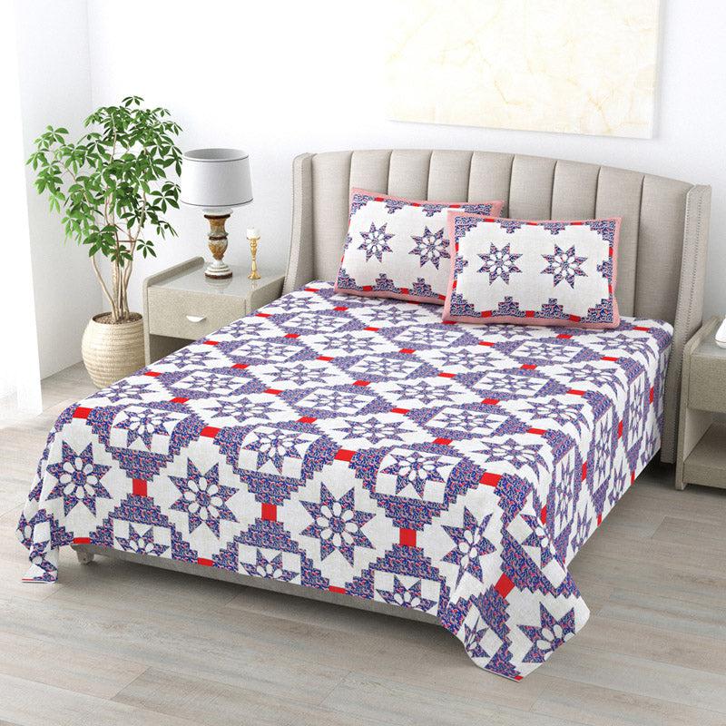 Buy Astrid Stellar Bedsheet - Purple & Red Bedsheets from Vaaree