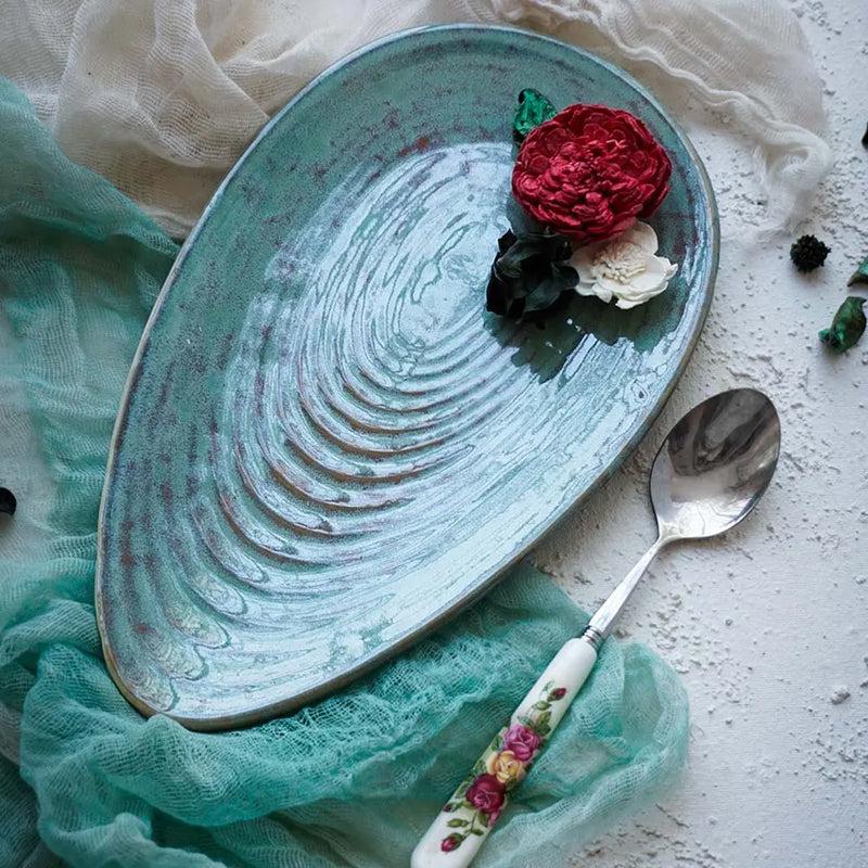 Buy Lexira Oyster Handmade Platter Platter from Vaaree