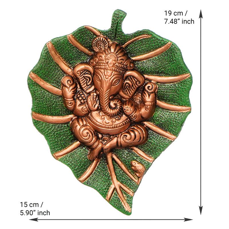 Buy Ganesha On Green Leaf Religious Wall Accent Wall Accents from Vaaree