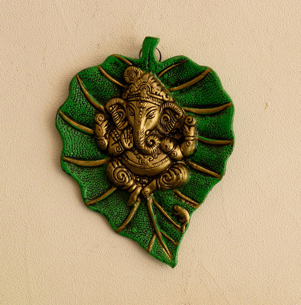 Buy Ganapati On Green Leaf Religious Wall Accent Wall Accents from Vaaree