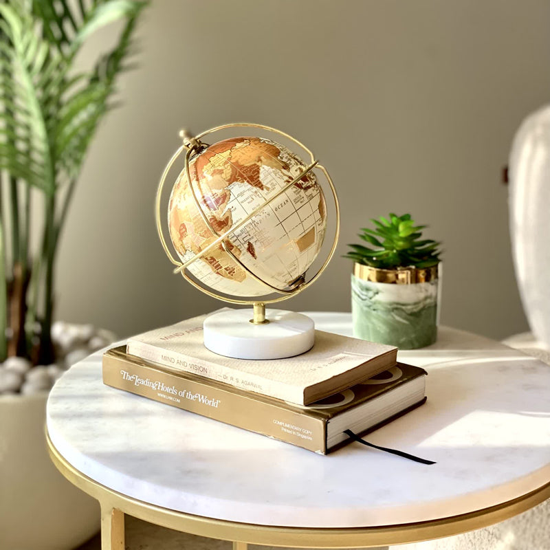 Buy Metrico Globe Showpiece - Ivory & Gold Showpieces from Vaaree