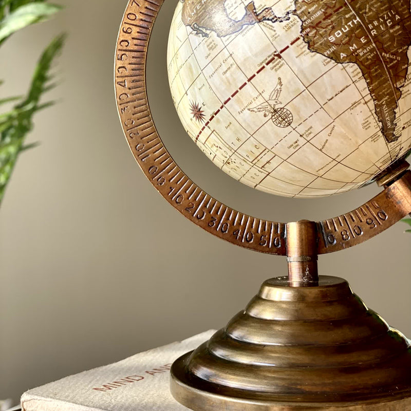 Buy Metrico Globe Showpiece - Beige & Antique Brown Showpieces from Vaaree