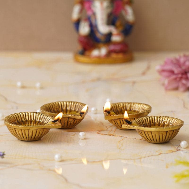 Buy Terda Decorative Brass Diya - Set Of Four Diyas from Vaaree