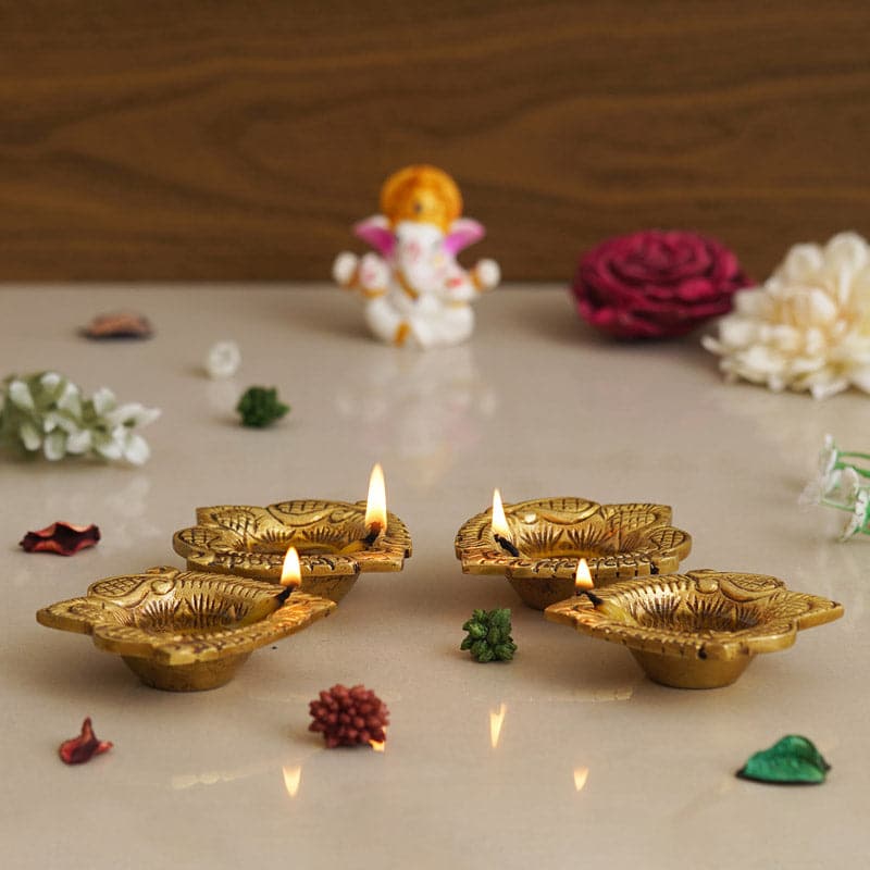 Buy Raavaa Brass Diya - Set Of Four Diyas from Vaaree