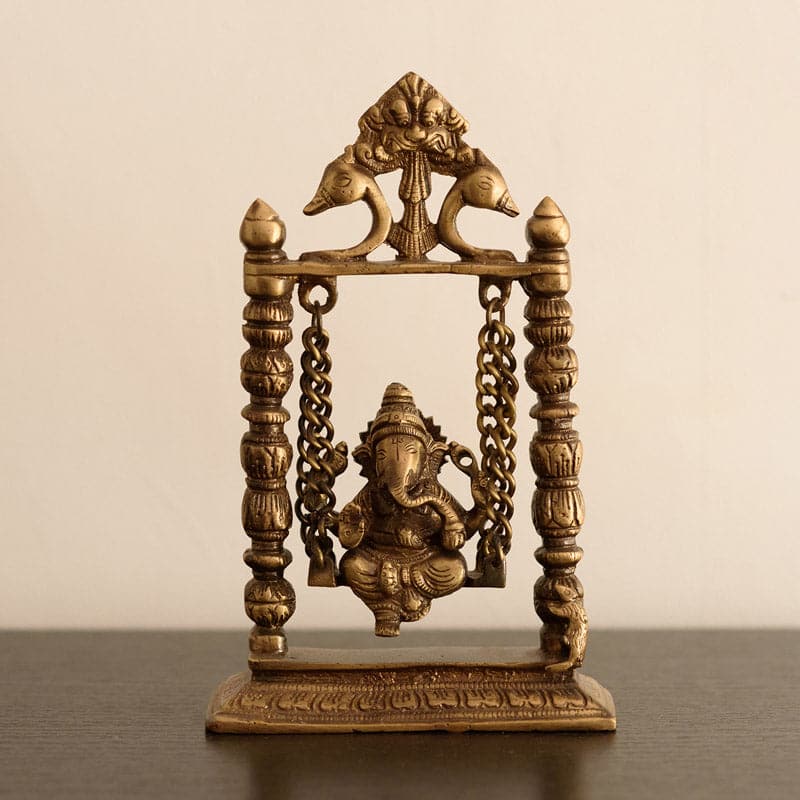 Buy Playful Ganesha On Swing Showpiece Idols & Sets from Vaaree