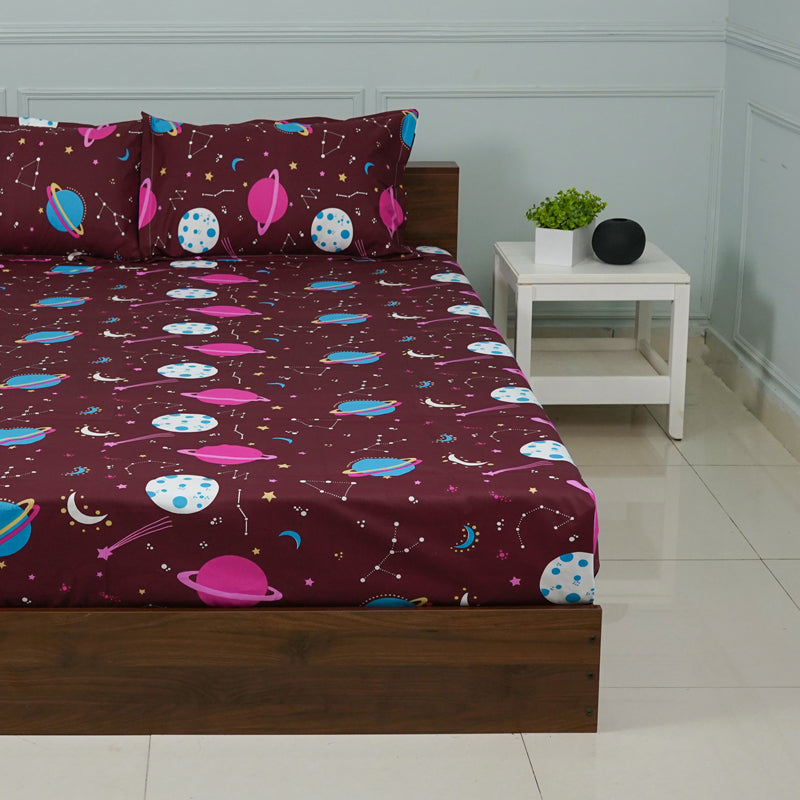 Buy Galaxy Ride Kids Neon Print Bedsheet - Maroon Bedsheets from Vaaree