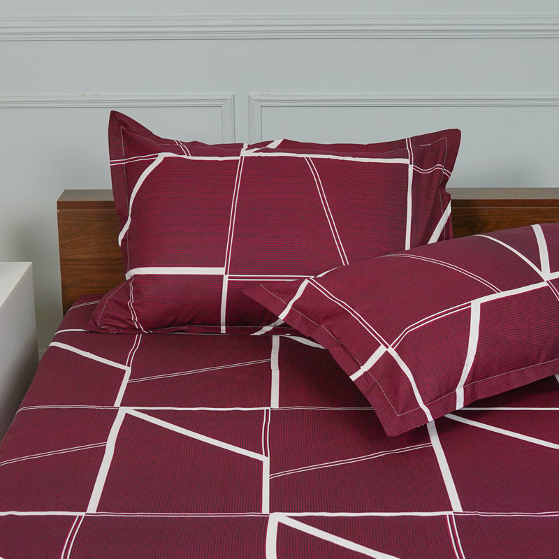 Buy Manal Geomatric Neon Print Bedsheets - Maroon Bedsheets from Vaaree