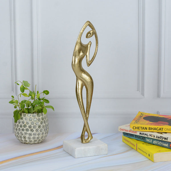 Buy Stretch Shape Showpiece - Gold Showpiece from Vaaree