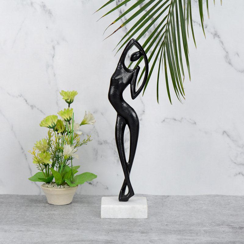 Buy Stretch Shape Showpiece - Black Showpieces from Vaaree