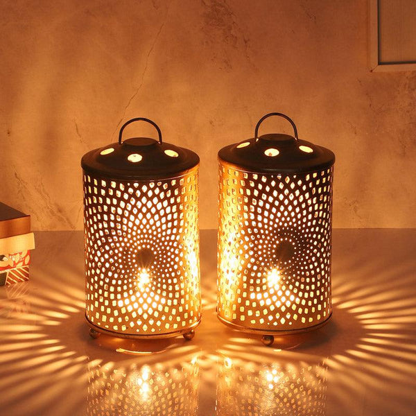 Buy Floare Cylinder Tealight Candle Holder - Set Of Two Candle Holders from Vaaree