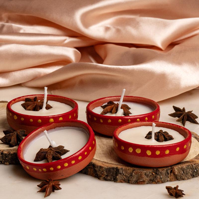 Buy Miya Handpainted Cinnamon Scented Candle - Set Of Four Candles from Vaaree