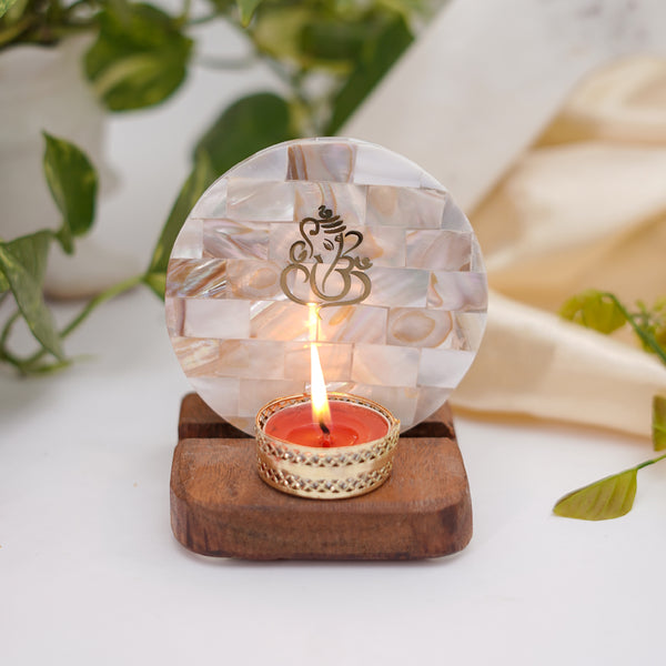 Buy Ganesha Mother Of Pearl Religious Accent With Tealight Candle Holder Candle Holders from Vaaree