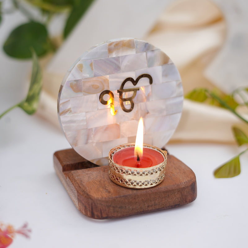 Buy Ik Onkar Mother Of Pearl Religious Accent With Tealight Candle Holder Candle Holders from Vaaree