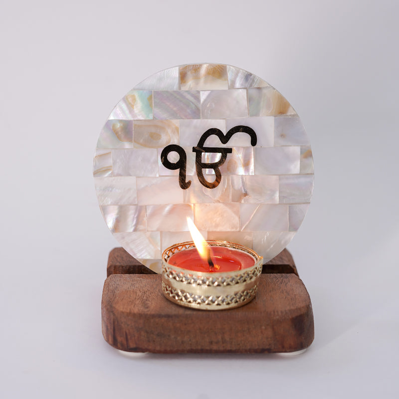 Buy Ik Onkar Mother Of Pearl Religious Accent With Tealight Candle Holder Candle Holders from Vaaree