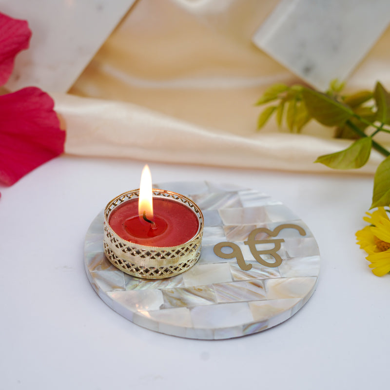 Buy In Onkar Mother Of Pearl Tealight Candle Holder With Marble Base Candle Holders from Vaaree