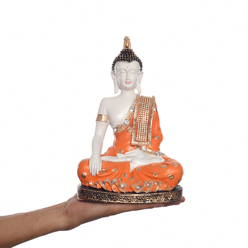 Buy Mediatating Buddha Showpiece - Orange Idols & Sets from Vaaree