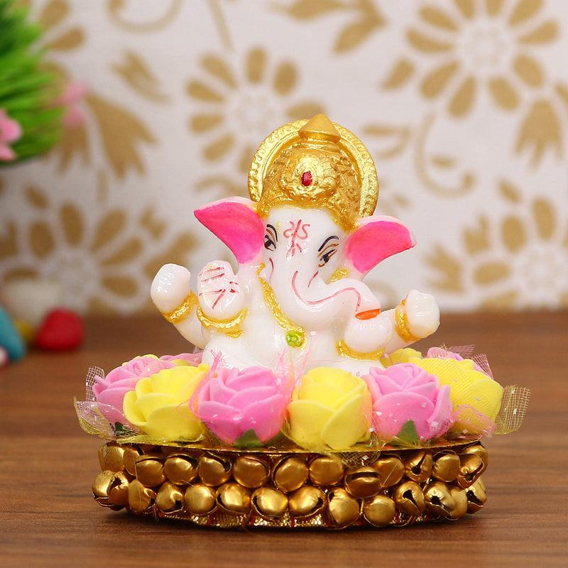 Buy Lord Vinayak Pooja Tealight Candle Holder - Yellow & Pink Idols & Sets from Vaaree