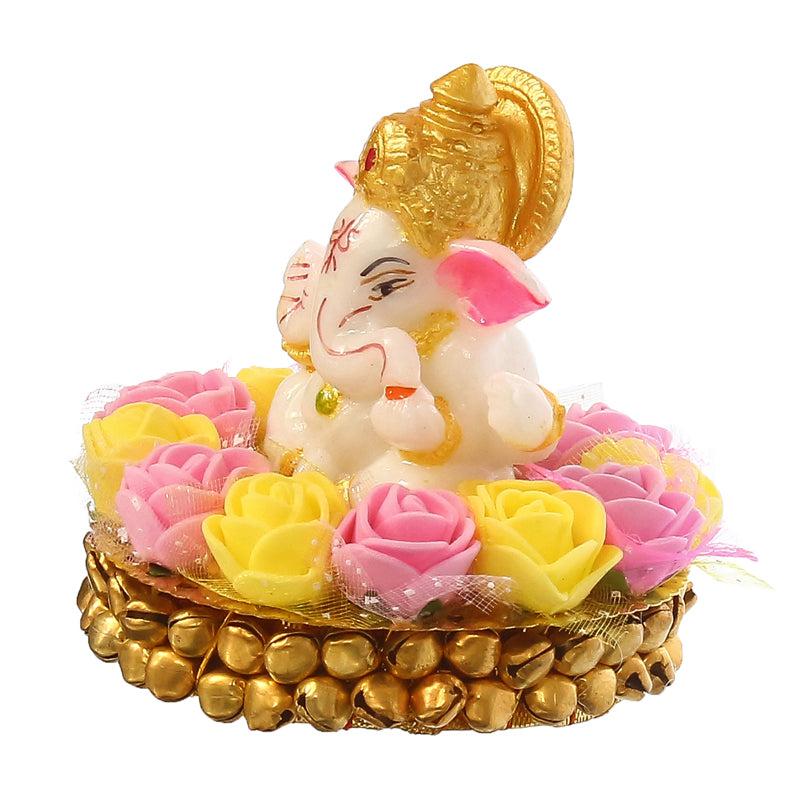 Buy Lord Vinayak Pooja Tealight Candle Holder - Yellow & Pink Idols & Sets from Vaaree