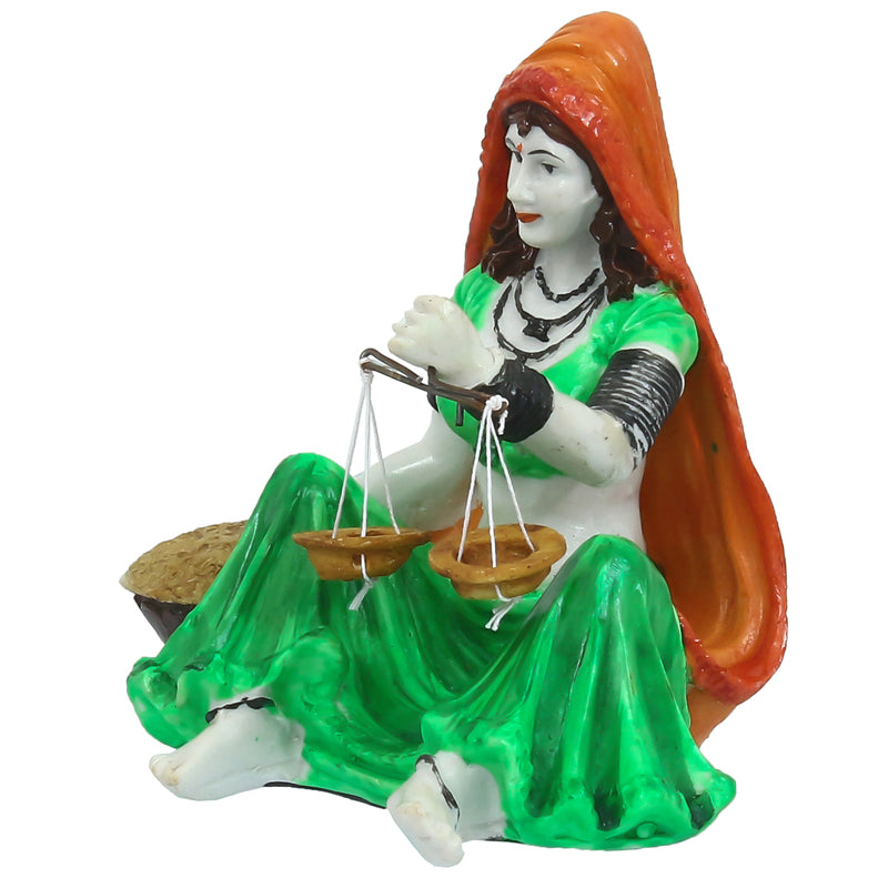 Buy Rajasthani Lady Chore Showpiece Showpieces from Vaaree