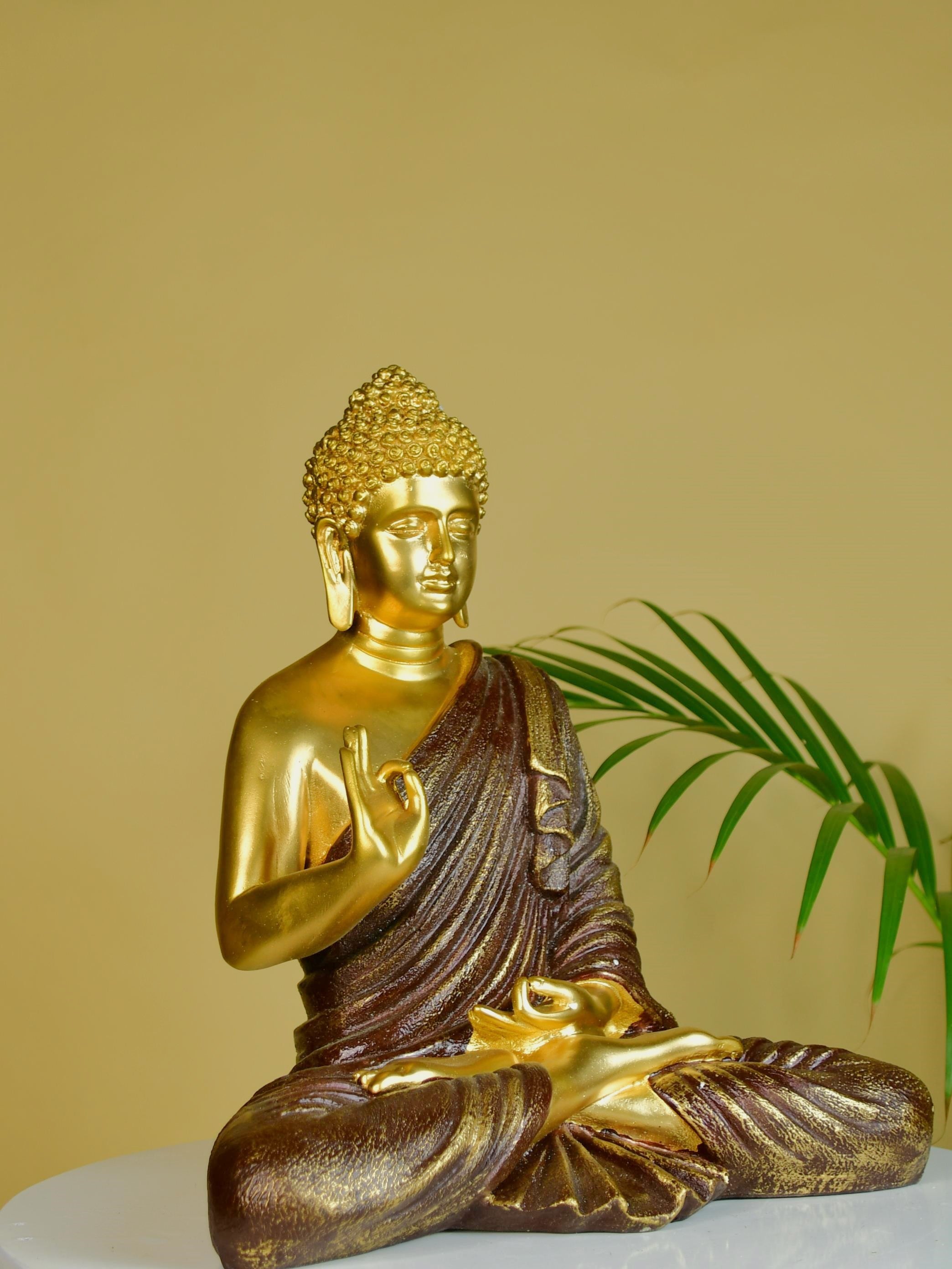 Buy Buddha Blessing Resin Showpiece - Gold & Brown Showpieces from Vaaree