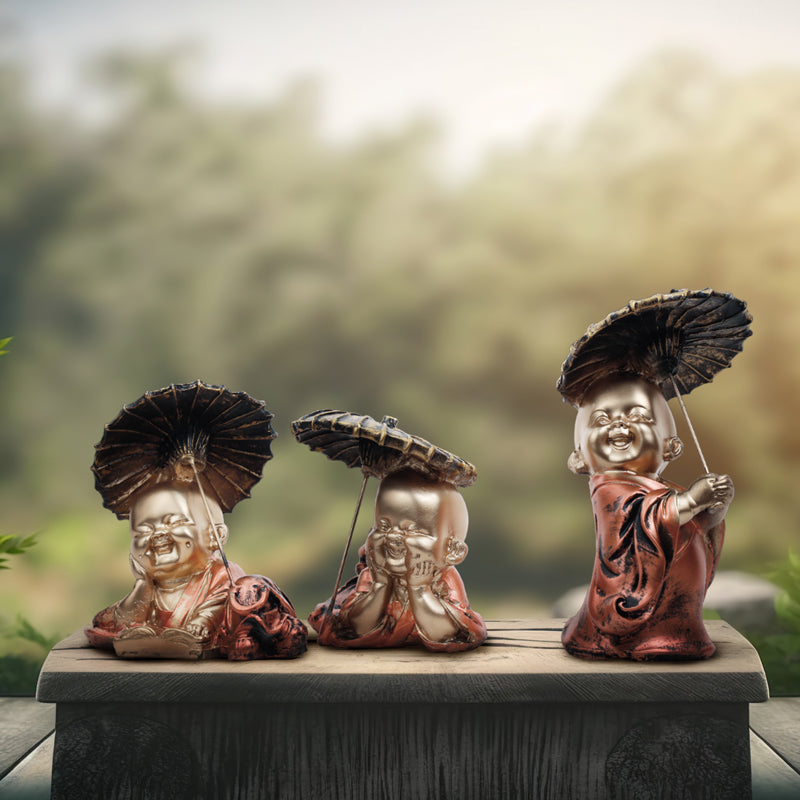 Buy Joyful Little Monk Showpiece Showpieces from Vaaree