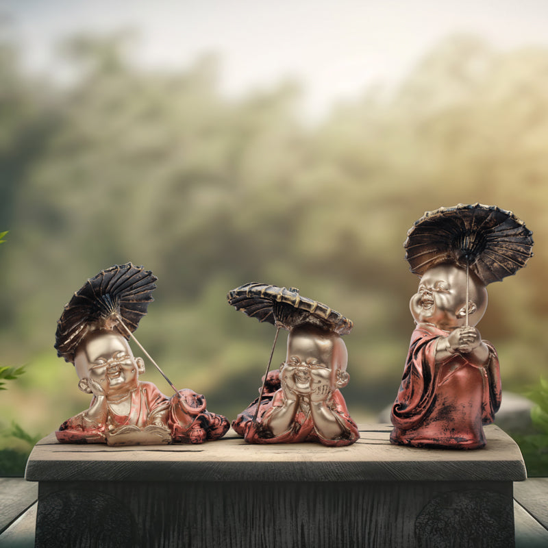 Buy Joyful Little Monk Showpiece Showpieces from Vaaree