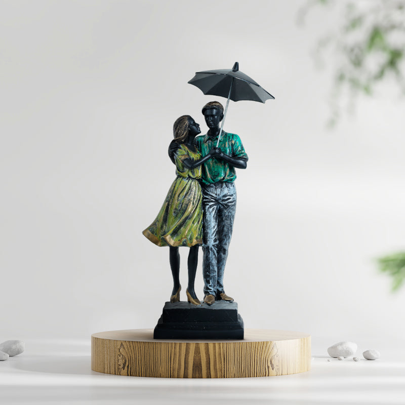 Buy Couple In Rain Showpiece Showpieces from Vaaree