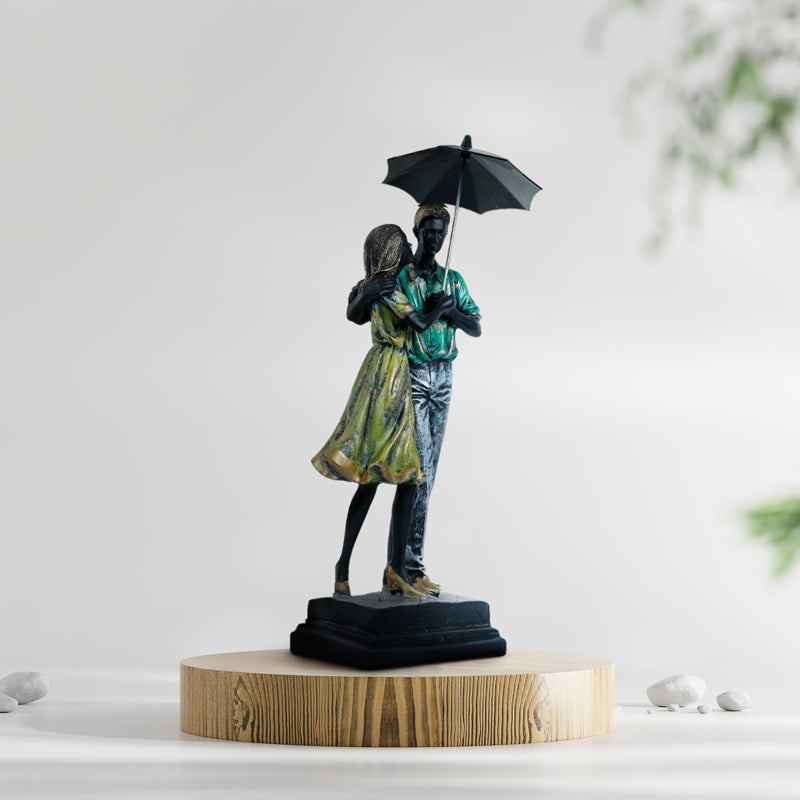 Buy Couple In Rain Showpiece Showpieces from Vaaree