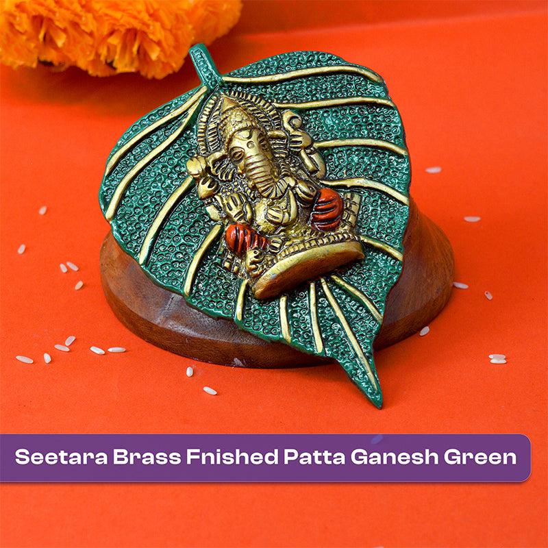 Buy Lord Ganesha On Peepal Leaf Idol Showpiece from Vaaree