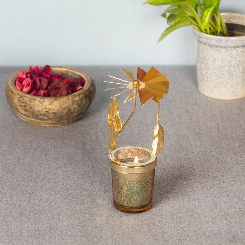 Buy Feather Rotating Candle Holder Candle Holders from Vaaree