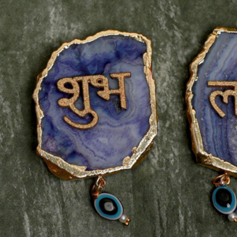 Buy Shub Labh Wall Accent (Blue) - Set Of Two Wall Accents from Vaaree