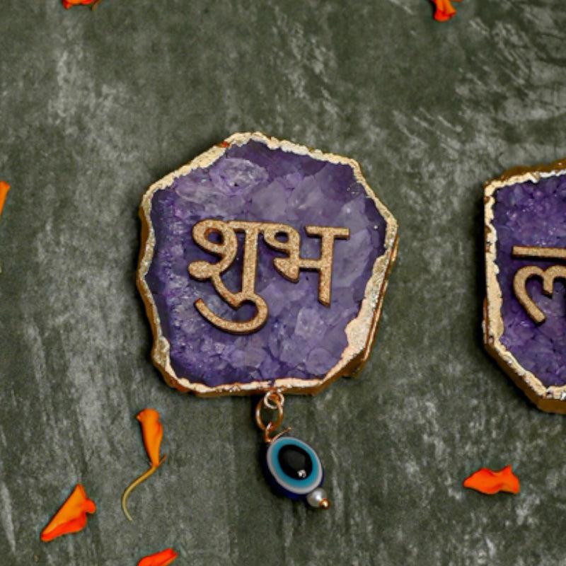 Buy Shub Labh Wall Accent (Purple) - Set Of Two Wall Accents from Vaaree