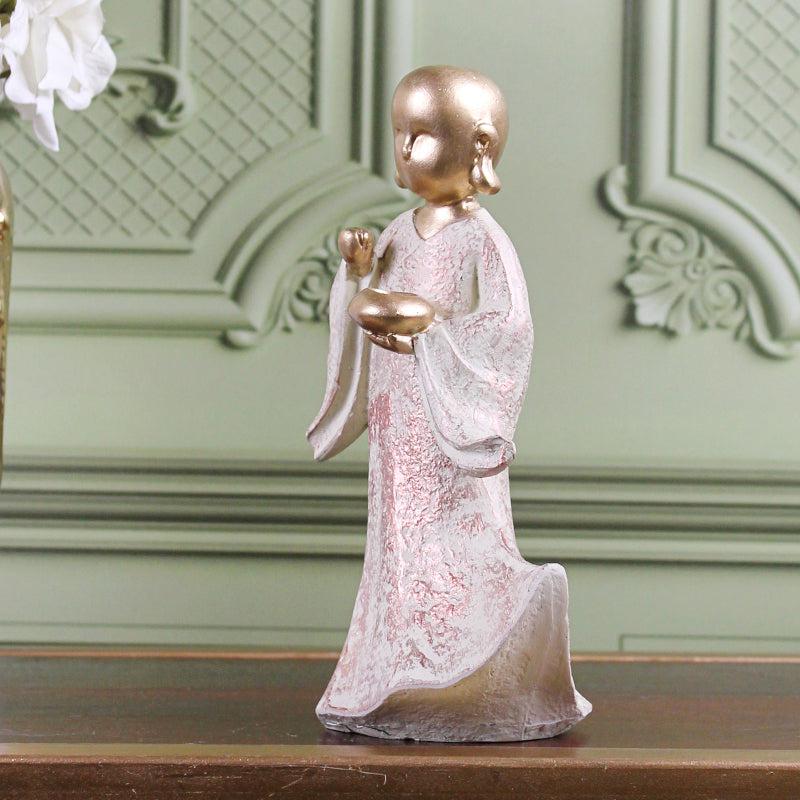 Buy Ethereal Little Monk Showpiece - Brown Showpieces from Vaaree