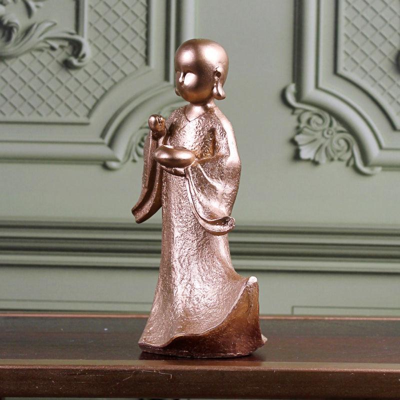 Buy Ethereal Little Monk Showpiece - Gold Showpieces from Vaaree