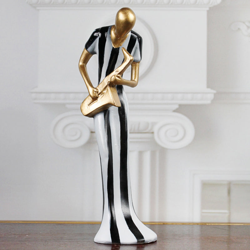 Buy Saxophone Symphony Showpiece - Black & White Showpieces from Vaaree