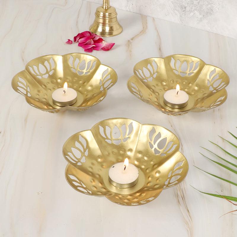 Buy Gold Lotus Tealight Candle Holder - Set Of Three Candle Holders from Vaaree