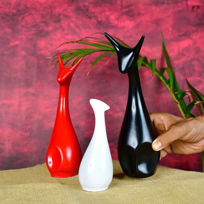 Buy Abstro Meow Showpiece Showpieces from Vaaree