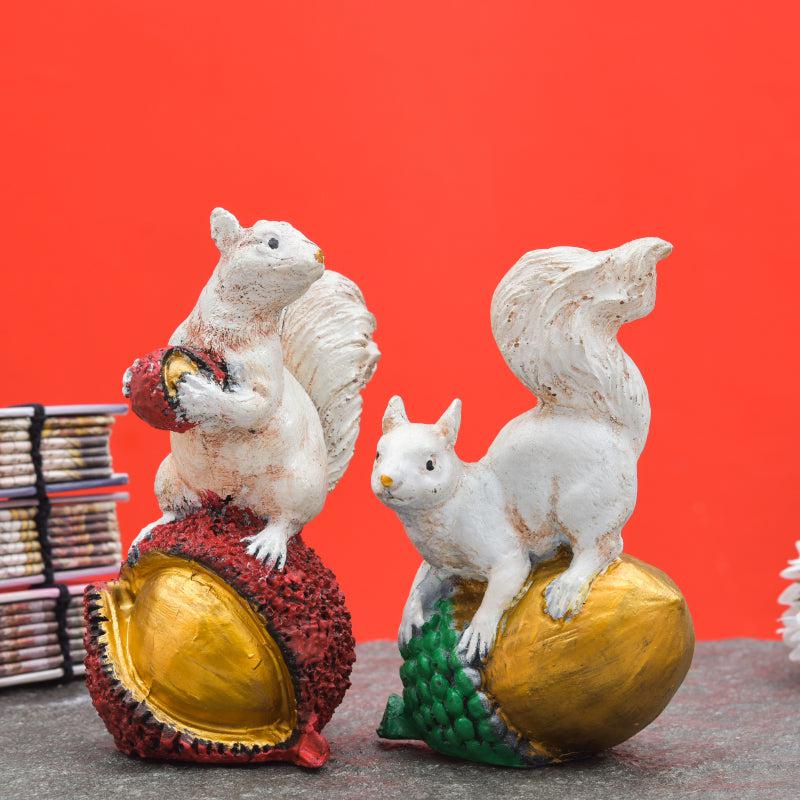 Buy Acorn Steal Squirrel Showpiece - Set Of Two Showpieces from Vaaree