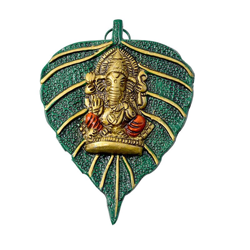 Buy Lord Ganesha On Peepal Leaf Idol Showpiece from Vaaree