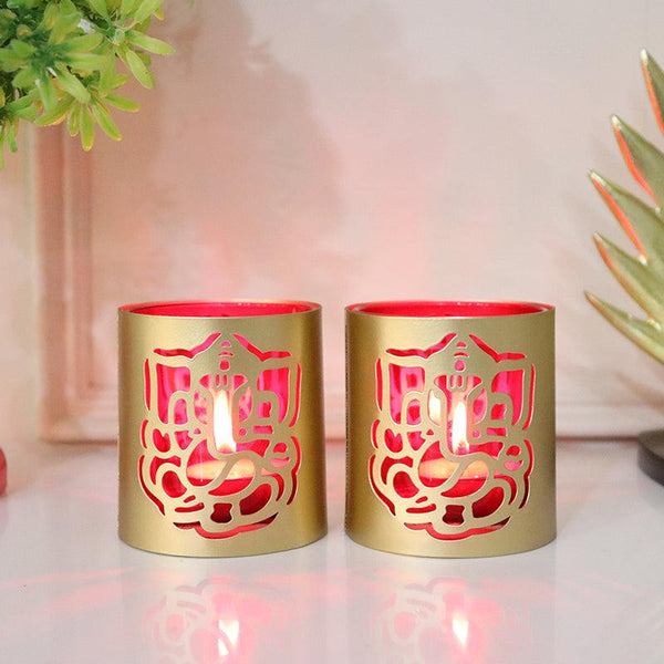 Buy Ganesha Chaitanya Tealight Candle Holder (Gold & Red) - Set Of Two Candle Holders from Vaaree