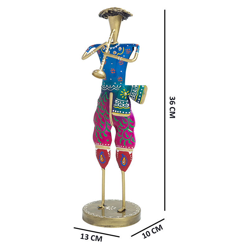 Buy Decorative Man With Flute Showpiece Showpieces from Vaaree