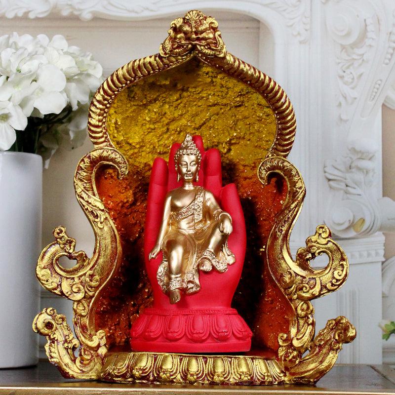 Buy Buddha Balance Showpiece - Red & Gold Showpieces from Vaaree