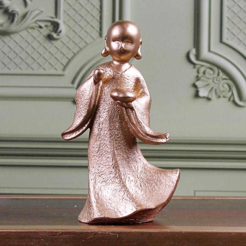 Buy Ethereal Little Monk Showpiece - Gold Showpieces from Vaaree