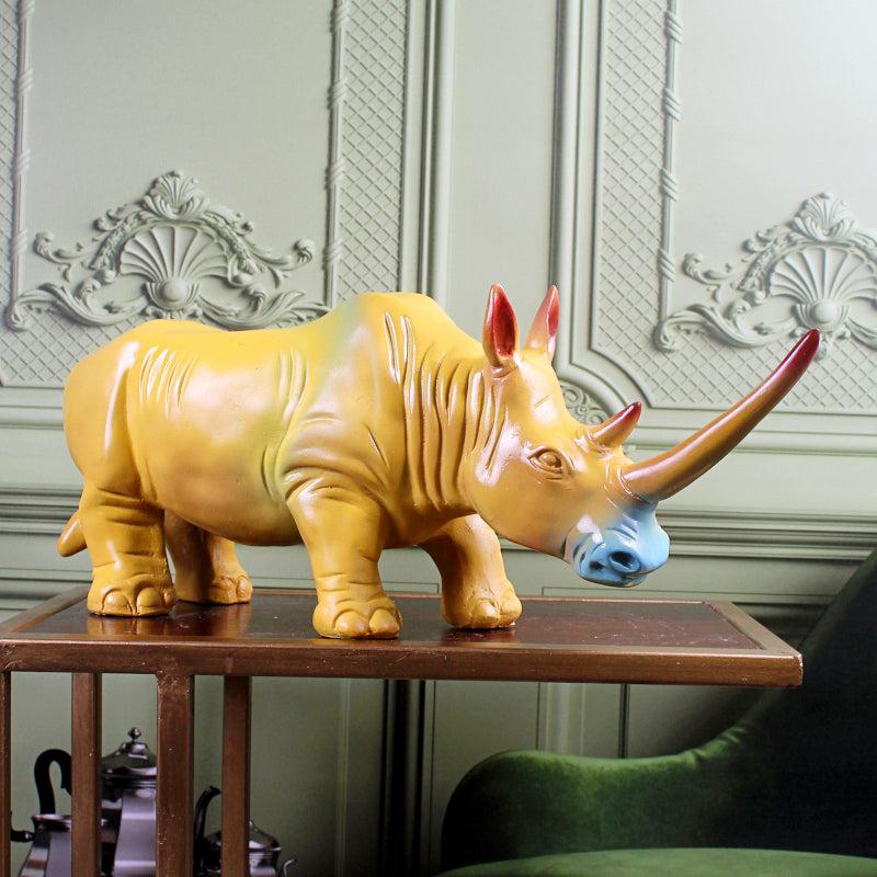 Buy Power Rhino Showpiece - Yellow Ochre Showpieces from Vaaree