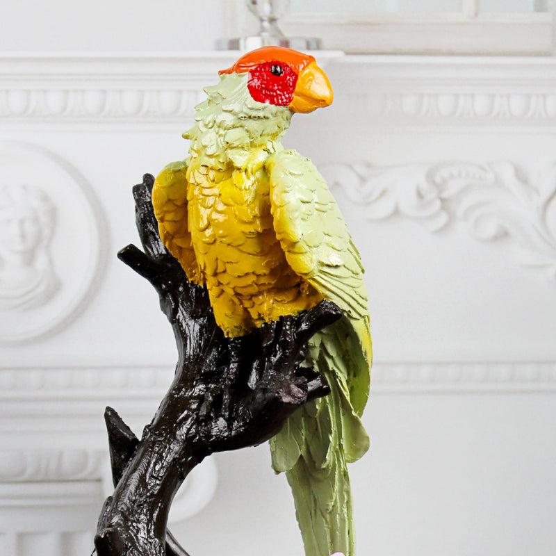 Buy Pinto Parrot Showpiece - Yellow Showpieces from Vaaree