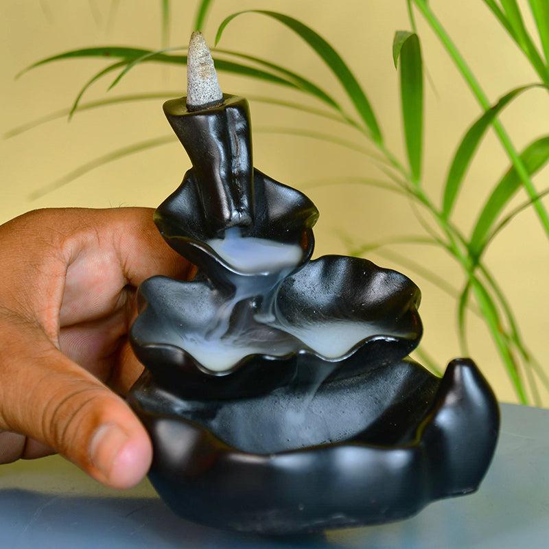 Buy Nira Smoke Fountain Showpieces from Vaaree