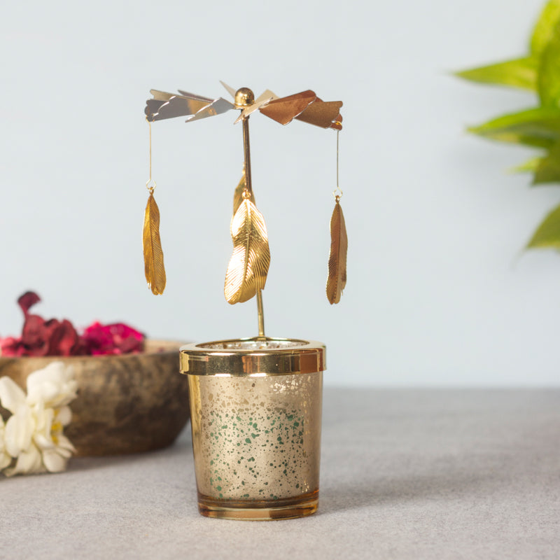 Buy Feather Rotating Candle Holder Candle Holders from Vaaree