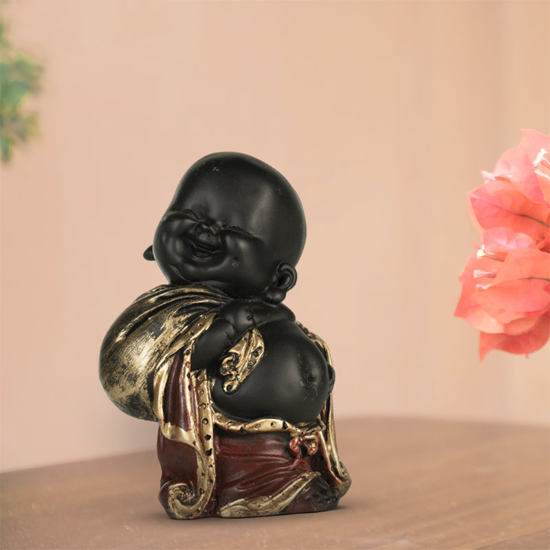 Buy Baby Monk Laugh Showpiece Showpiece from Vaaree