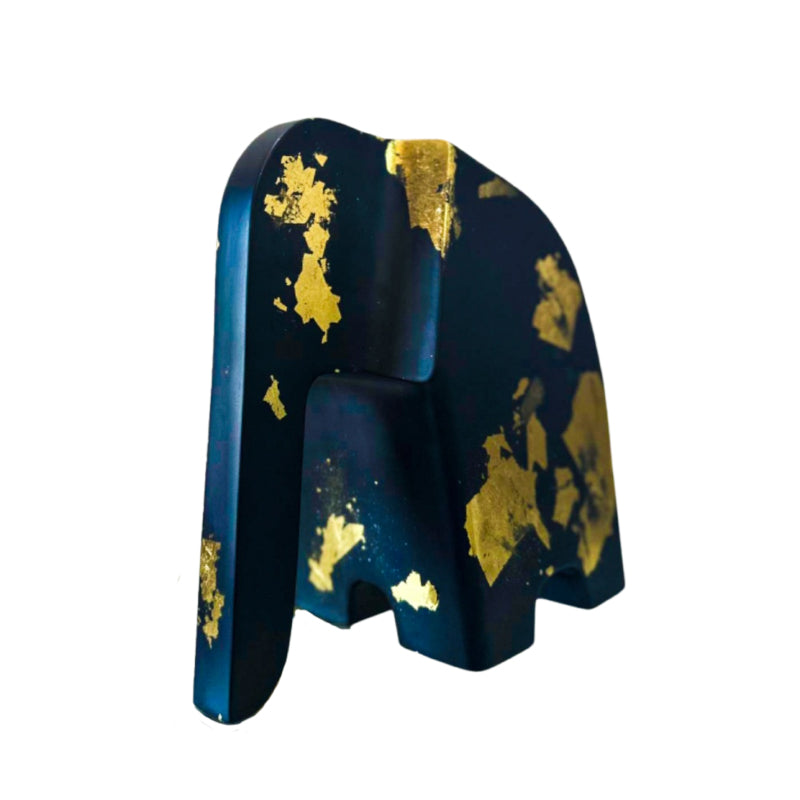 Buy Symmetrical Tusker Showpiece - Black & Gold Showpieces from Vaaree